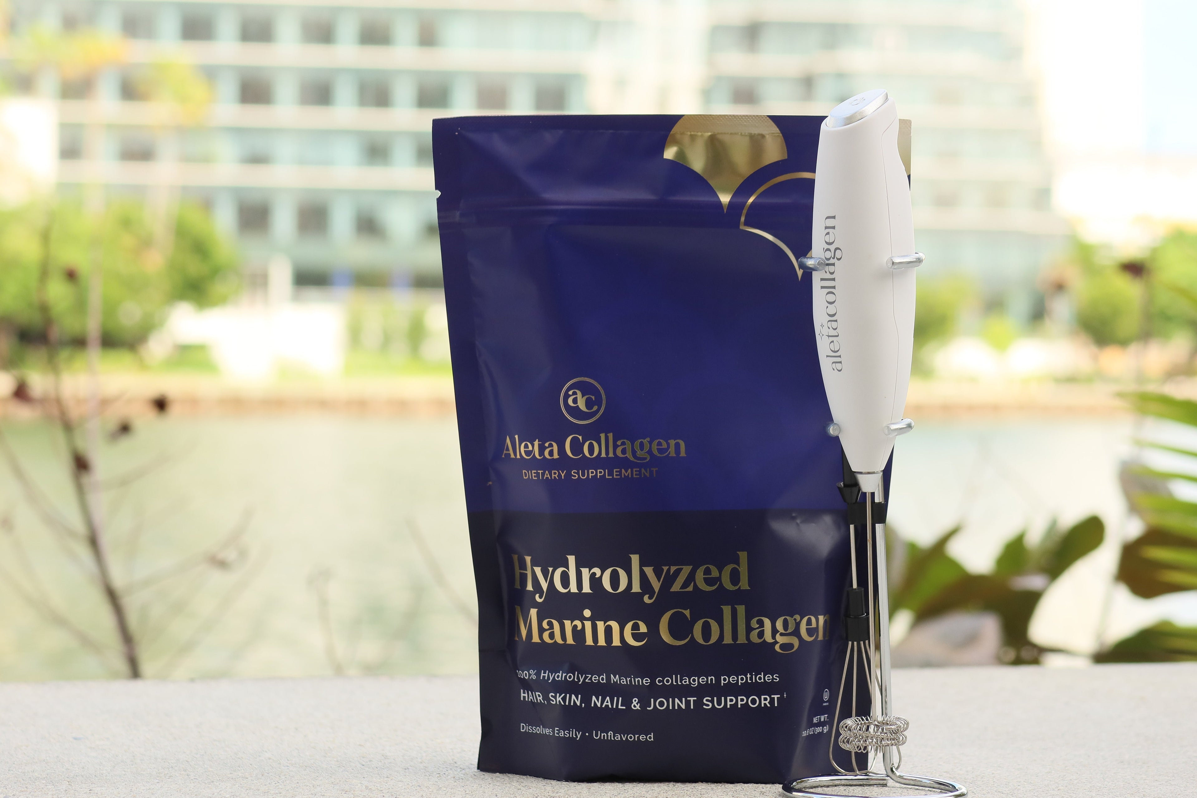 Aleta Collagen hydrolyzed marine collagen package on a blurred outdoor background